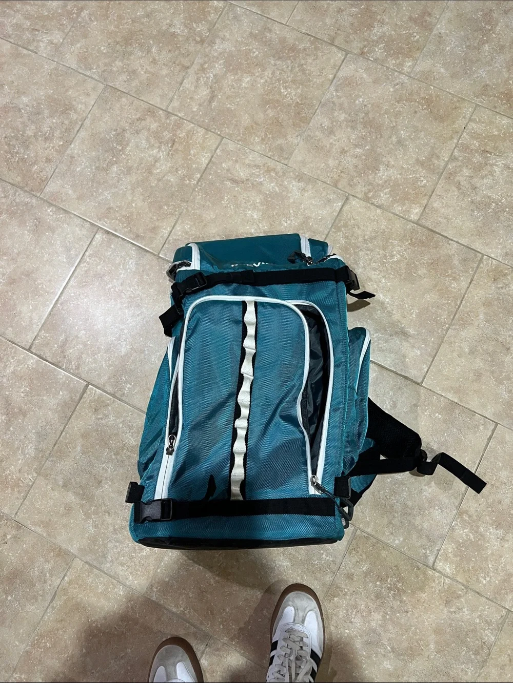 Teal Men's Travel Backpack with Multiple Compartments